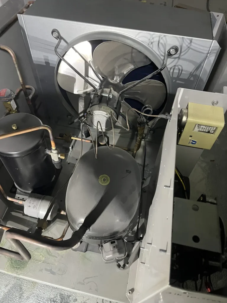 Walk-in cooler condensing unit and compressor during startup