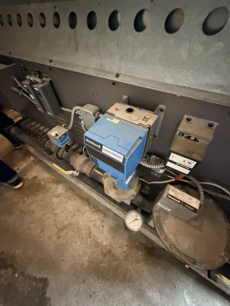 Control valve actuator on a mechanical room piping run