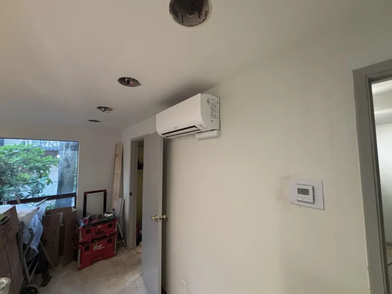 Ductless wall unit and thermostat in a leasing office