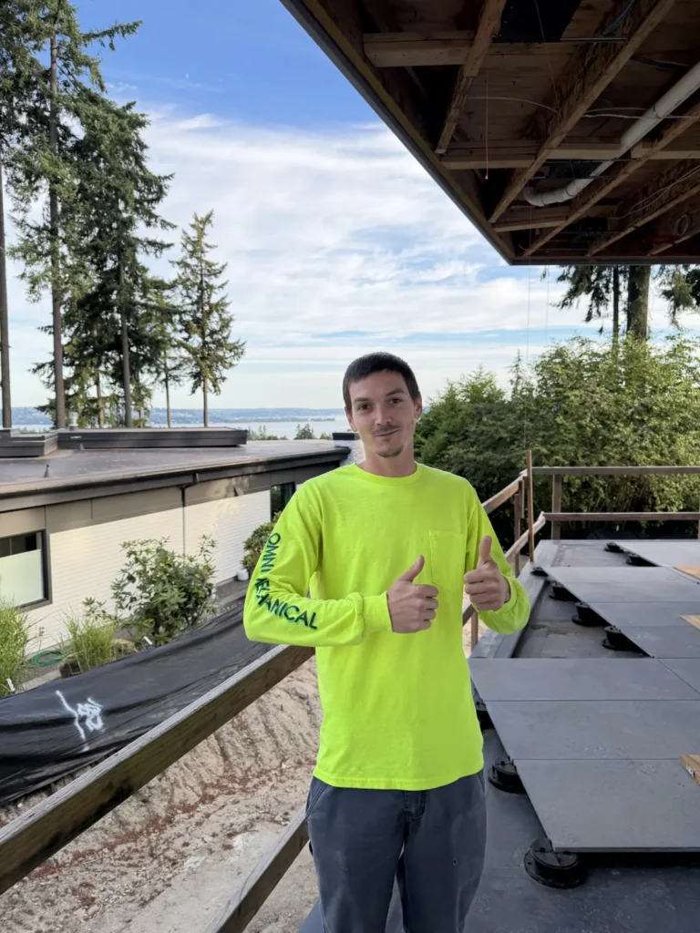 Omni Mechanical technician on a rooftop job