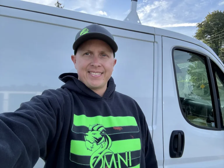 Omni Mechanical technician at his van