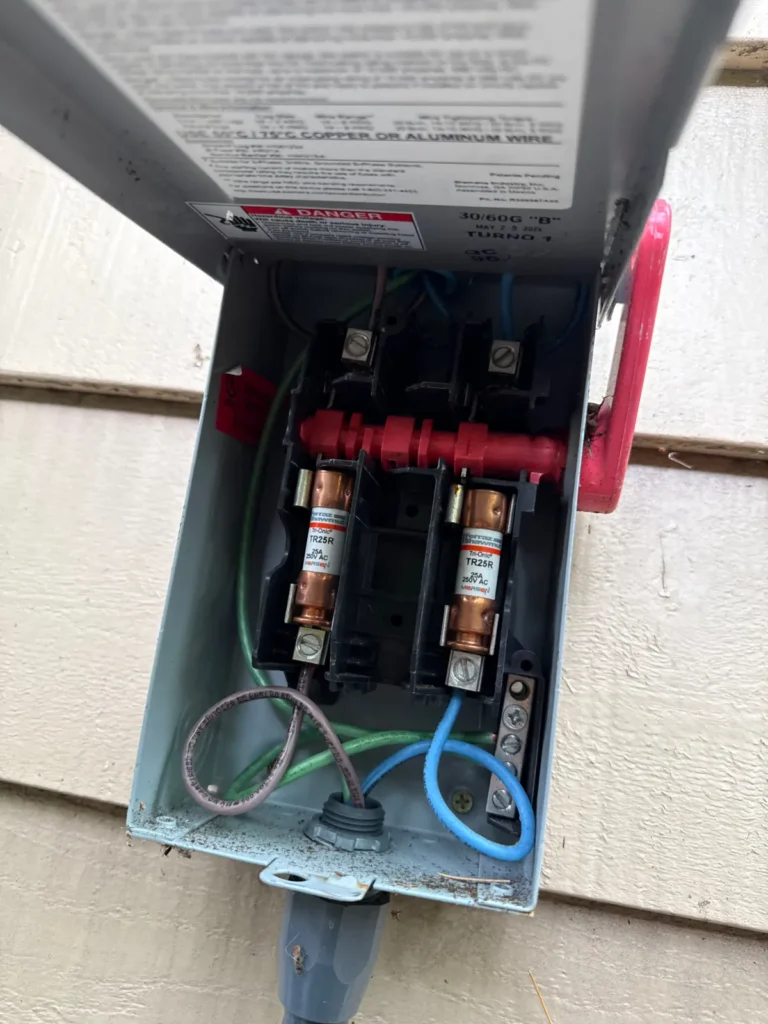 Outdoor electrical disconnect at a mini-split condenser