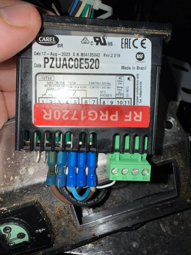 Refrigeration case controller being replaced