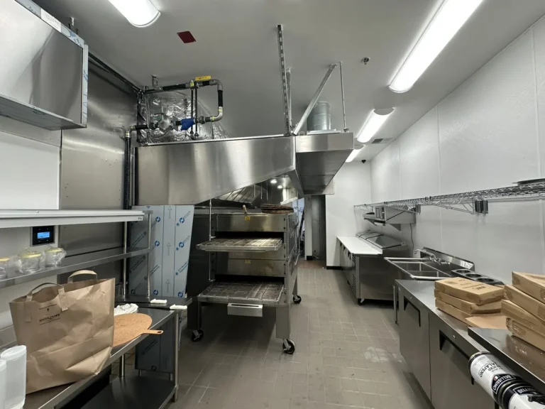 Commercial kitchen hood line over the cooking equipment in a Seattle restaurant