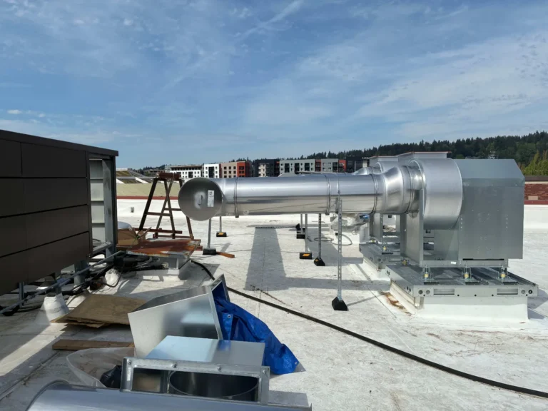 Rooftop exhaust fan and ductwork on a new restaurant build-out
