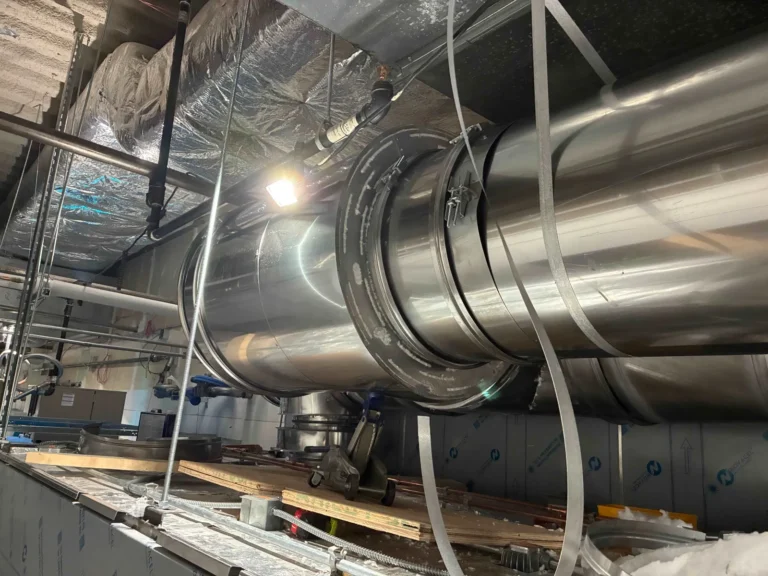 Large spiral duct run installed during a restaurant tenant improvement