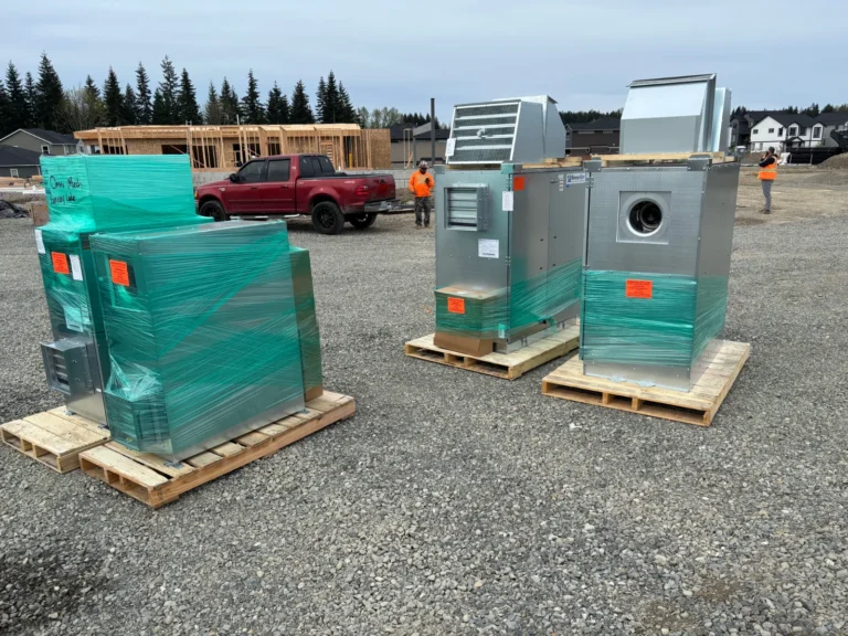 New VRF fan coil units staged on site at a clubhouse project in Bonney Lake